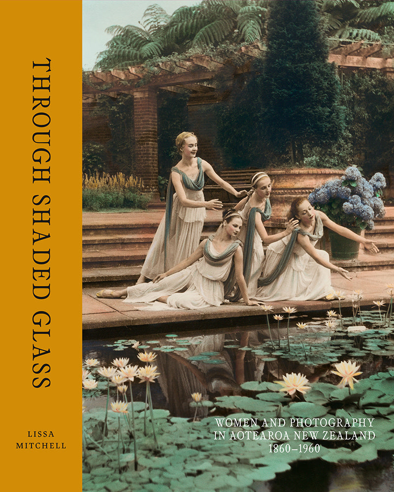 Front cover of the book featuring an image of four women in classical dress gazing and gesturing into a still pond filled with water lilies