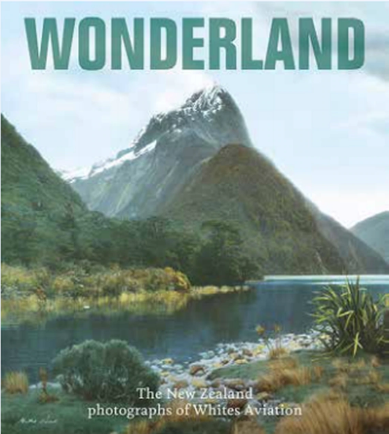 Front cover of the book featuring a photograph of a landscape including a snow-capped mountain with a lake at its base